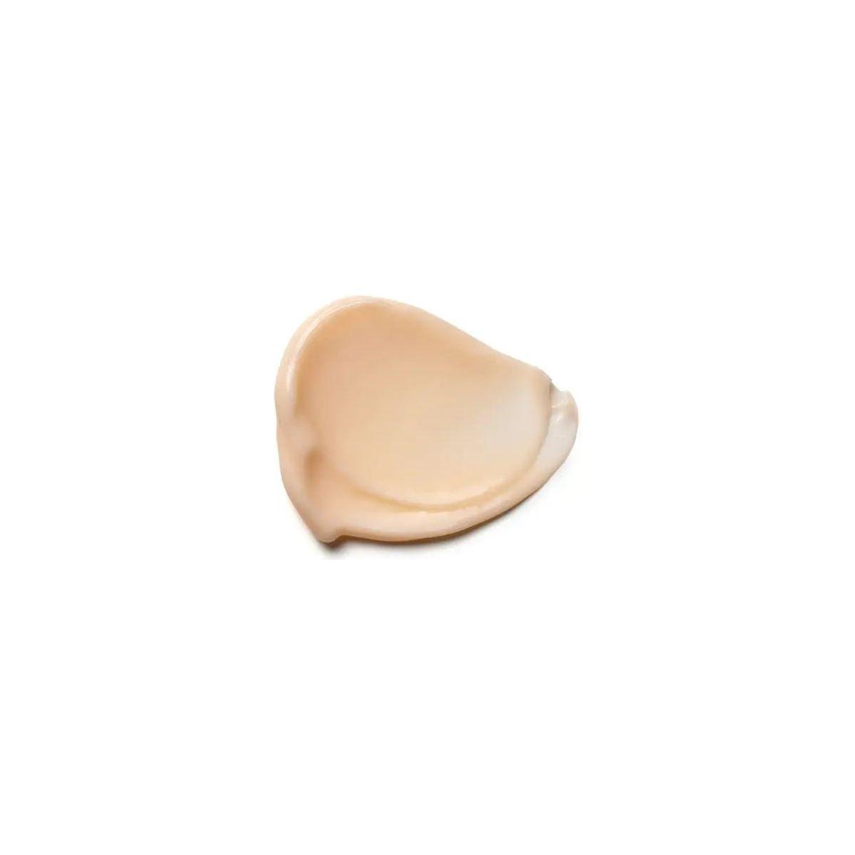 Smooth beige texture of Moroccanoil Intense Curl Cream for natural curls and waves nourishing with argan oil and vitamins.