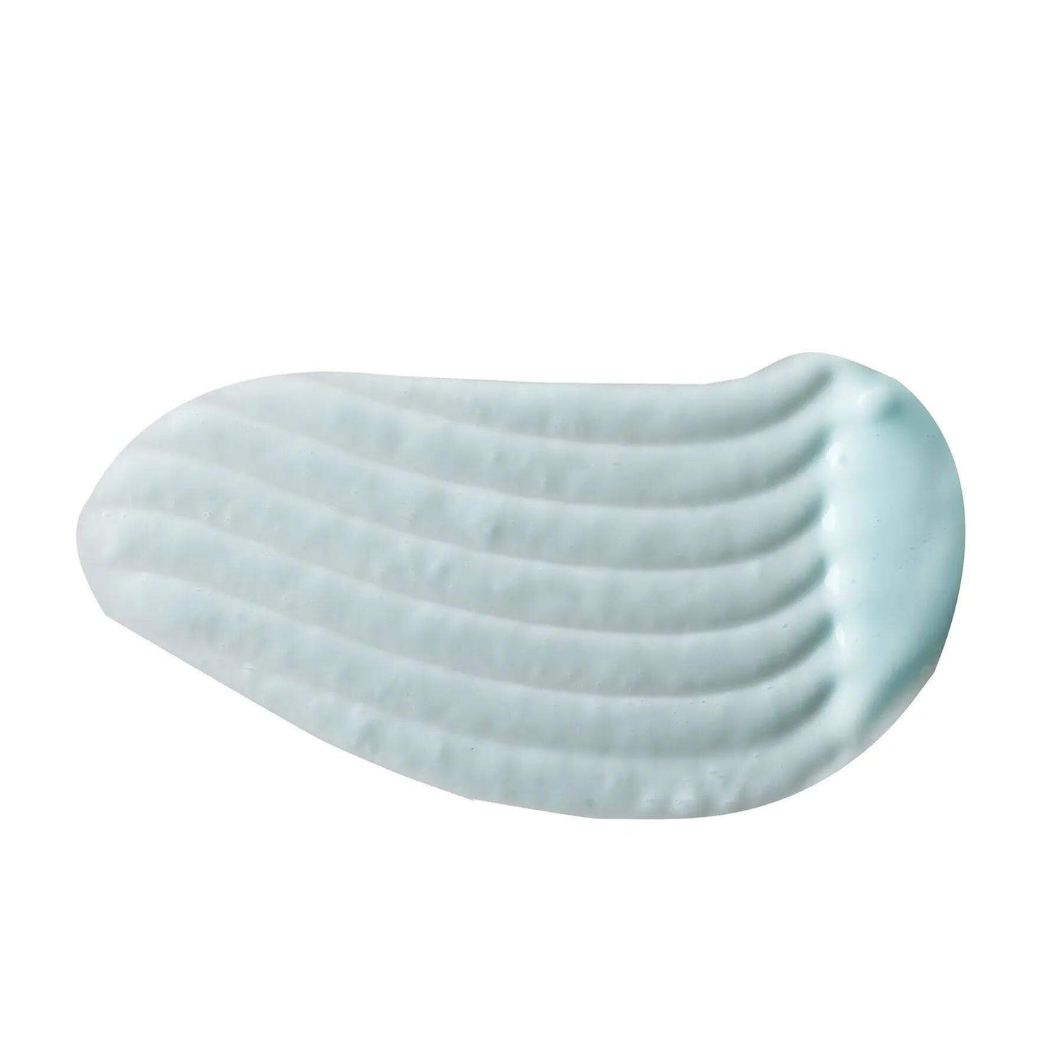 Texture of Yonka Lait Nettoyant cleansing milk showing creamy consistency for removing makeup and impurities.