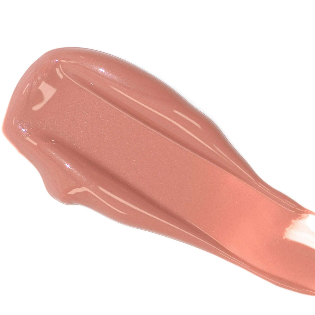 Lip Colour Serum swatch showcasing natural nude shade with high-shine finish, infused with organic ingredients for hydration and plumping.