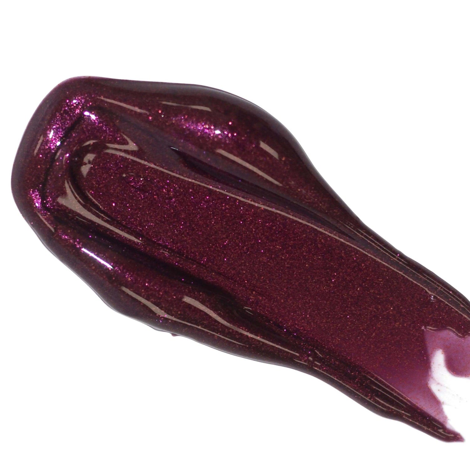 Deep purple lip gloss serum swatch with shimmer, showcasing nourishing and plumping properties for enhanced lip hydration.