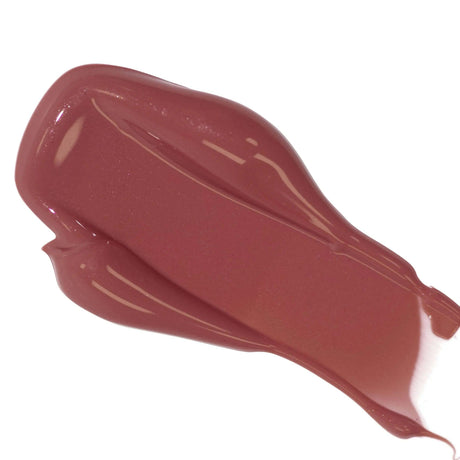 Rich mauve lip color serum swatch with nourishing ingredients for natural hydration and plumping effect.