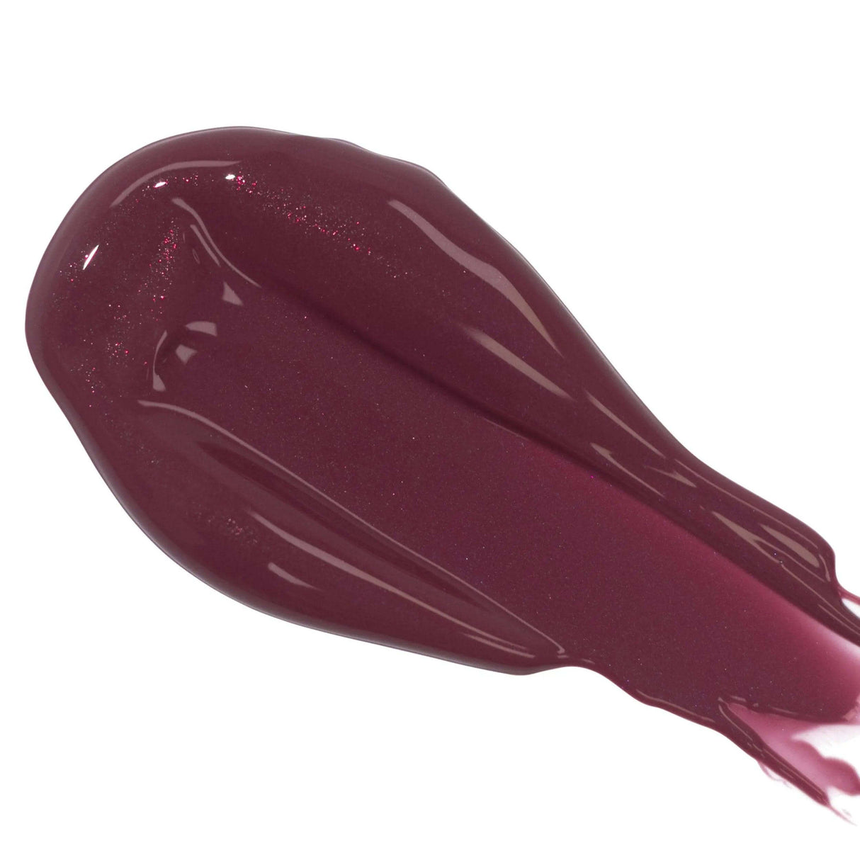 Lip Colour Serum swatch in deep berry shade, showcasing glossy texture and rich pigmentation for vibrant, hydrated lips.