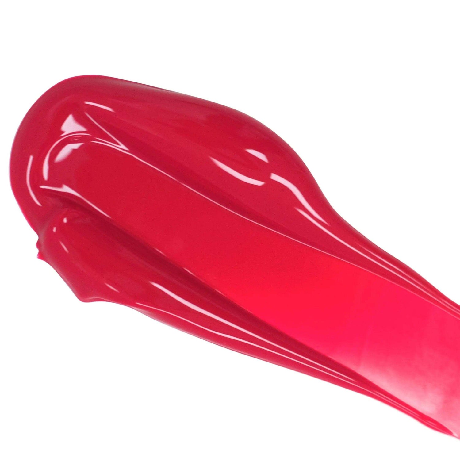 Vibrant red swatch of plant-based lip color serum for hydration and plumping, infused with antioxidants and organic ingredients.