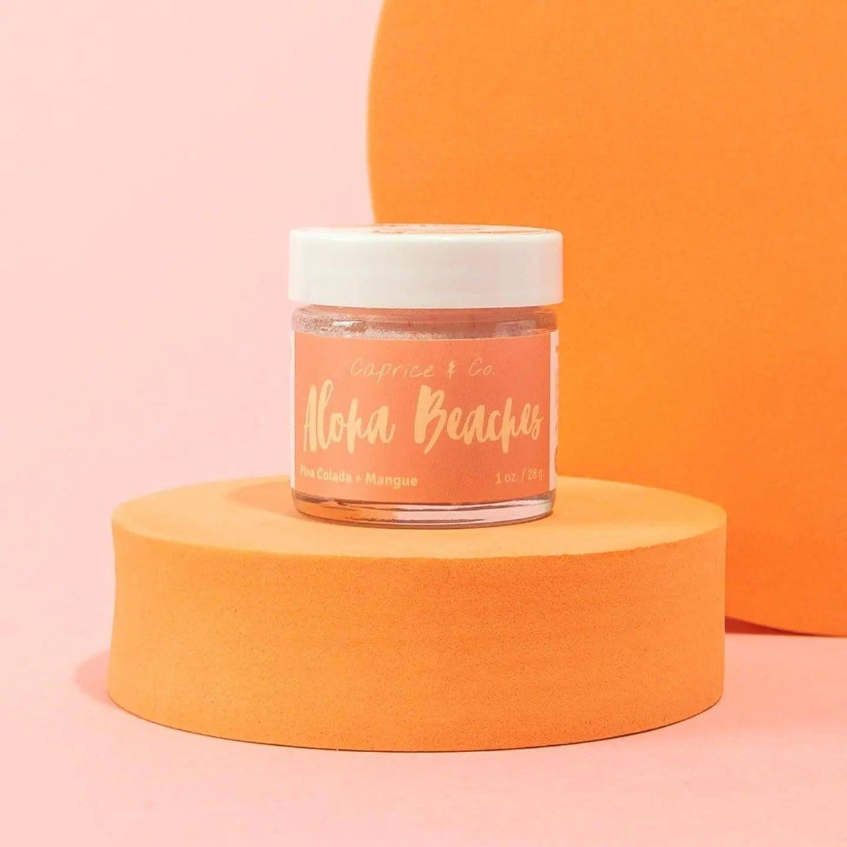 Aloha Beaches Lip Scrub 1oz jar with Pina Colada Mango flavor, featuring hydrating jojoba oil and shea butter for smooth lips.