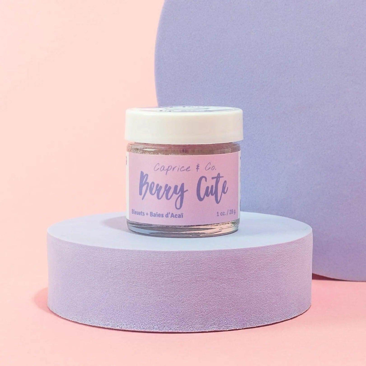 Lip Scrub Berry Cute jar on pastel background, 1oz - 28g, Acai and Blueberry flavor for smooth, hydrated lips.