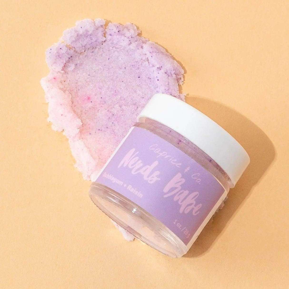 Lips Scrub - Nerds Babe in bubblegum and grape flavor, featuring fine sugar, organic Jojoba Oil and Shea butter for smooth lips.