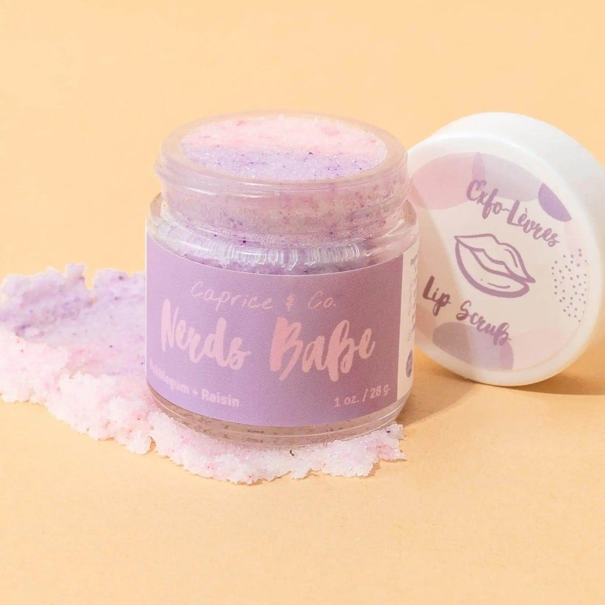 Nerds Babe Lip Scrub with bubblegum and grape flavor, 1 oz jar, exfoliating and moisturizing lip care with organic ingredients.