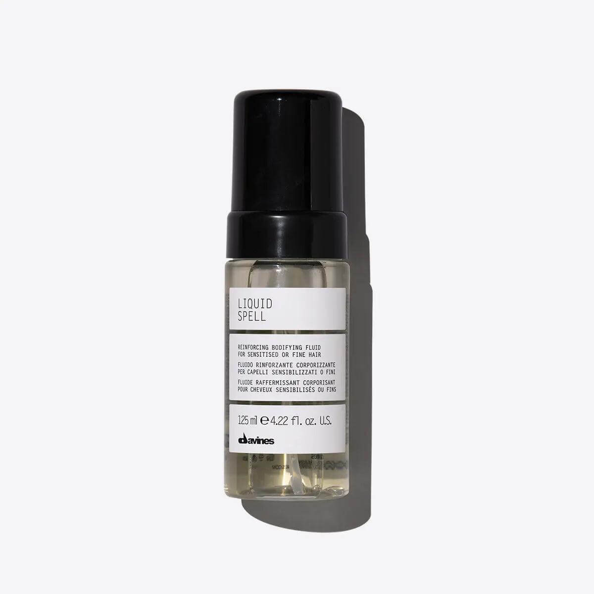 Davines Liquid Spell Reinforcing Bodifying Fluid bottle for volumizing and strengthening fine hair, 125ml size.