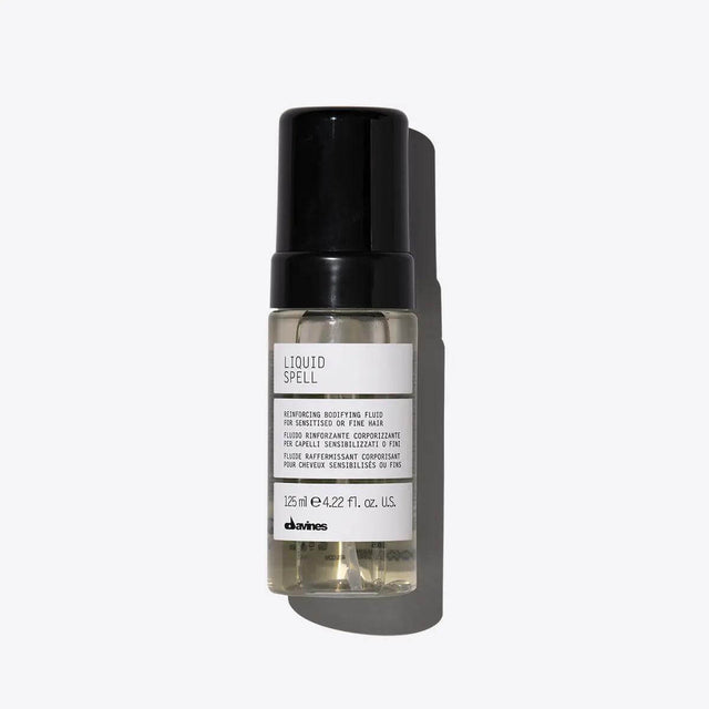 Davines Liquid Spell Reinforcing Bodifying Fluid bottle for volumizing and strengthening fine hair, 125ml size.
