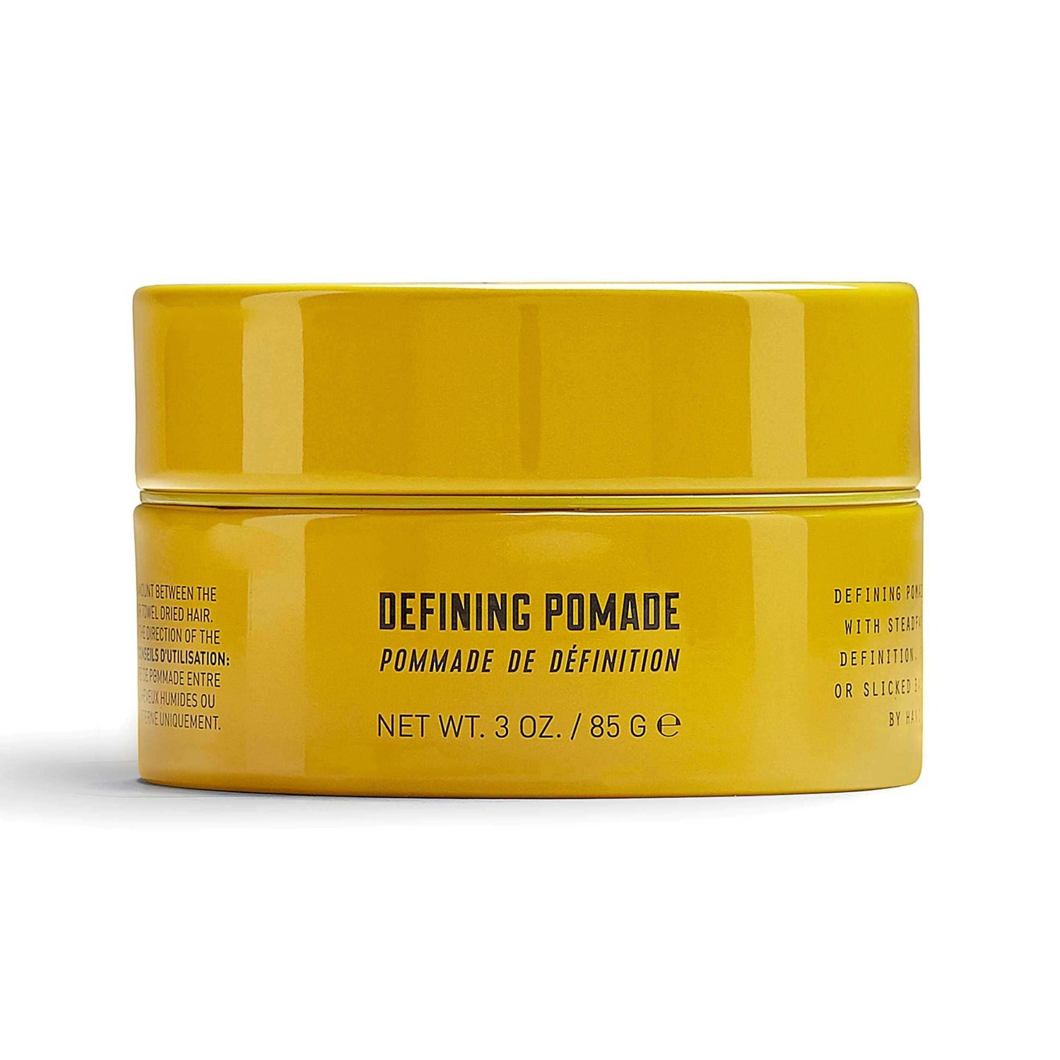 Yellow jar of Lock Stock & Barrel Defining Pomade, 85g, delivers strong hold and brilliant shine, ideal for slicked-back hairstyles.
