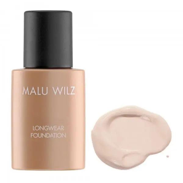 Malu Wilz Longwear Foundation bottle with liquid swatch demonstrating enduring coverage on a perfect complexion.