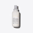 Davines Love Curl Primer product bottle for enhancing curly hair, reducing frizz, and boosting shine with nourishing ingredients.