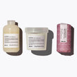 Davines Love Curl Set - Shampoo, Conditioner, and Curl Building Serum for enhancing and defining curly hair, ensures softness and hydration.