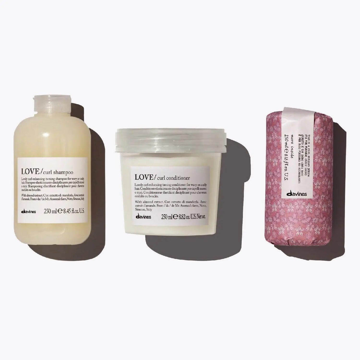 Davines Love Curl Set - Shampoo, Conditioner, and Curl Building Serum for enhancing and defining curly hair, ensures softness and hydration.