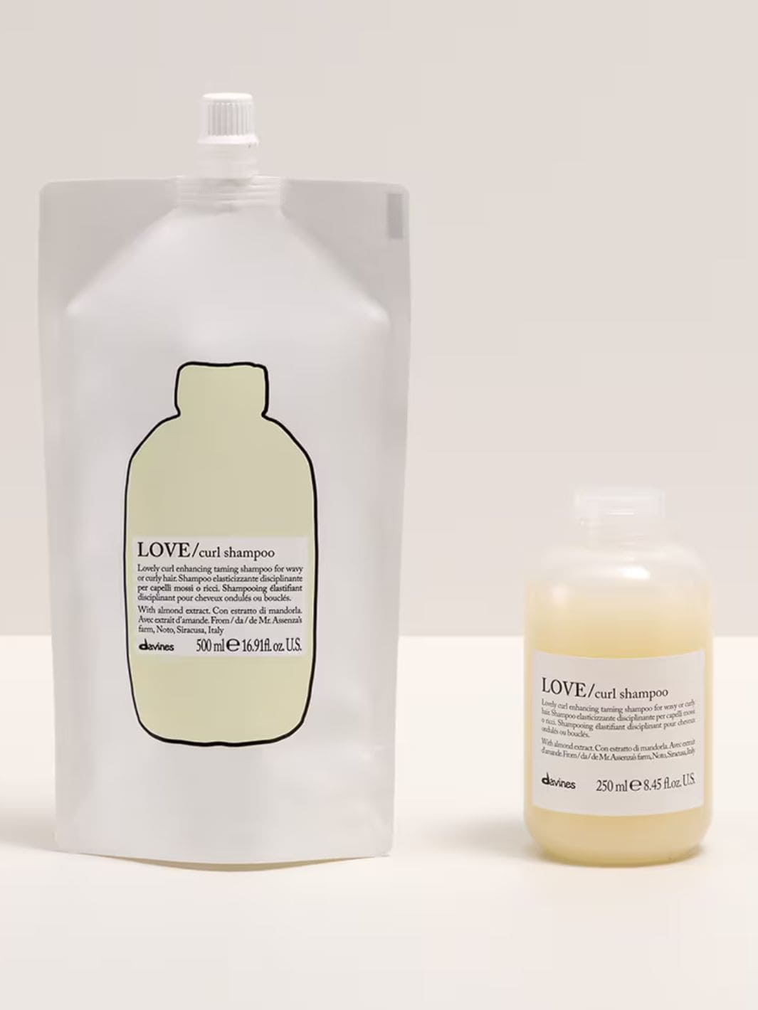 Love Curl Shampoo Refill packaging with almond extract, ideal for wavy and curly hair to boost curl elasticity and definition.