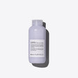Davines Love Hair Smoother bottle for curly and wavy hair, controls frizz, enhances curls, and leaves hair soft and silky.