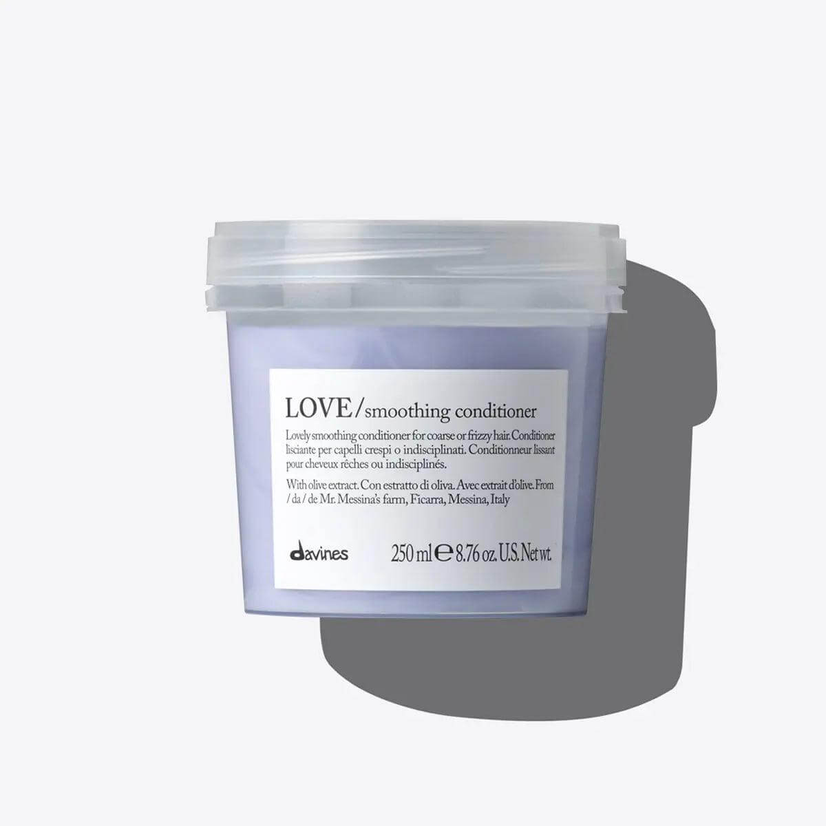 Davines Love Smoothing Conditioner 250ml for frizzy, unruly hair care, offers soft, silky, and manageable finish in a sleek container.