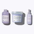 Davines Love Smoothing Essentials Set with shampoo, conditioner, and perfector for hydrating and smoothing frizzy hair.