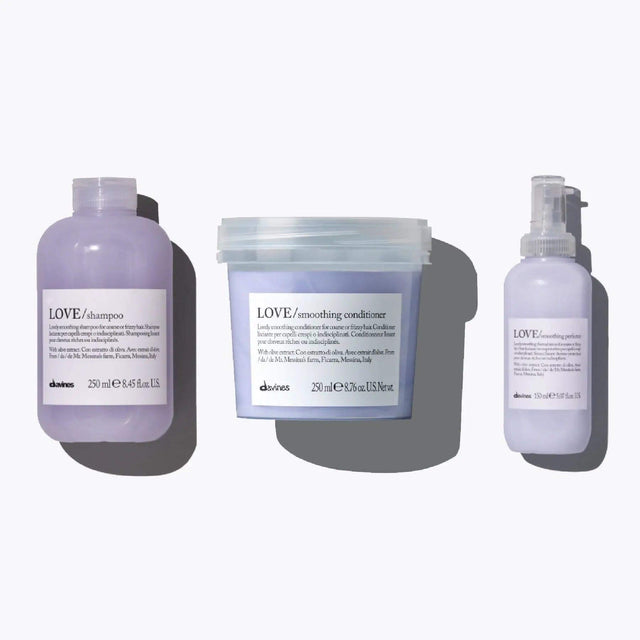 Davines Love Smoothing Essentials Set with shampoo, conditioner, and perfector for hydrating and smoothing frizzy hair.
