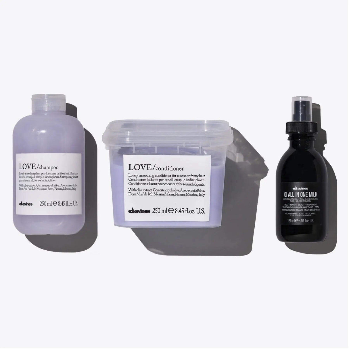 Davines Love Smoothing + Oi Set with shampoo, conditioner, and all-in-one milk for smooth, nourished hair