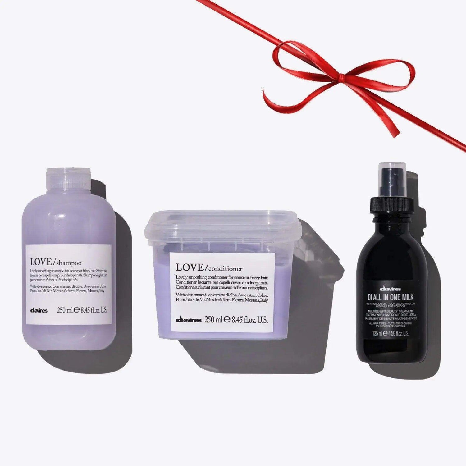 Davines Love Smoothing + Oi Set including Love Shampoo, Love Conditioner, and Oi All In One Milk for smooth and nourished hair.