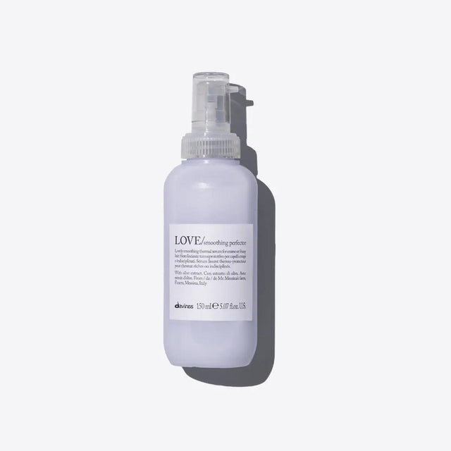 Love Smoothing Perfector serum for coarse frizzy hair, offering thermal protection and anti-frizz control with a creamy texture.