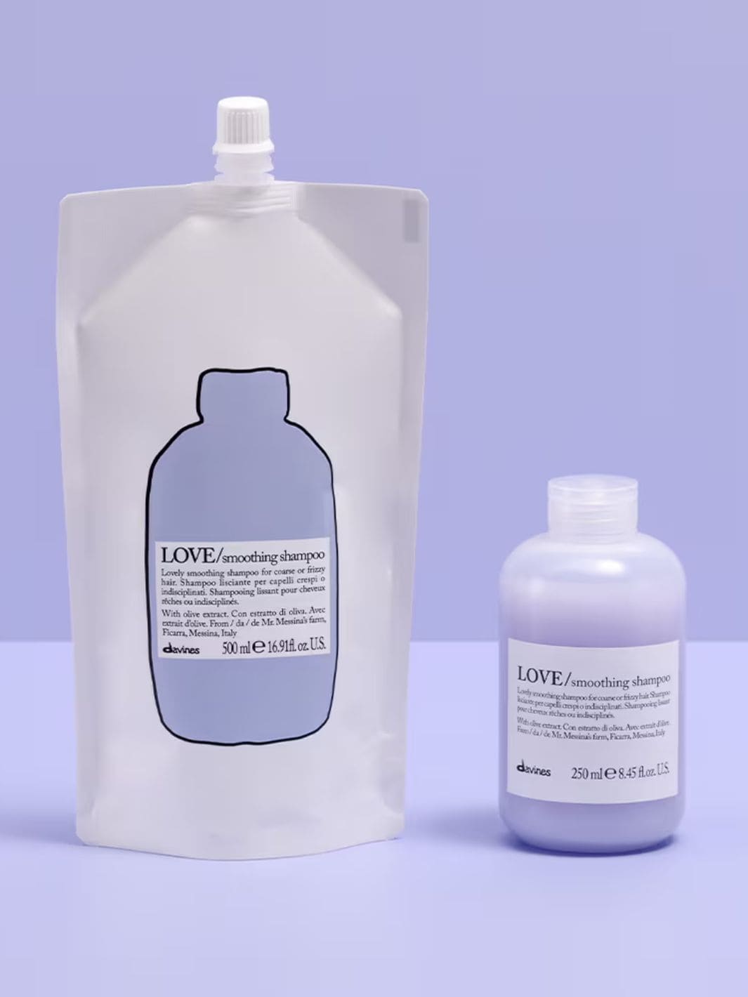 Love Smoothing Shampoo Refill with olive extract for frizzy hair, offering hydration and smoothness, in a refill and bottle packaging.