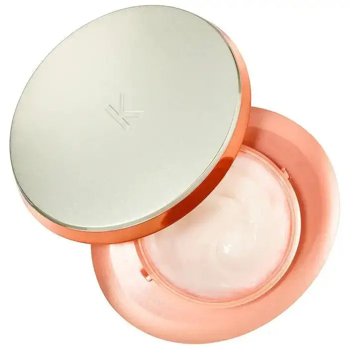 Kerastase Maskeratine hair mask in open container, designed to smooth frizz-prone, thick hair, offering nourishment and manageability.