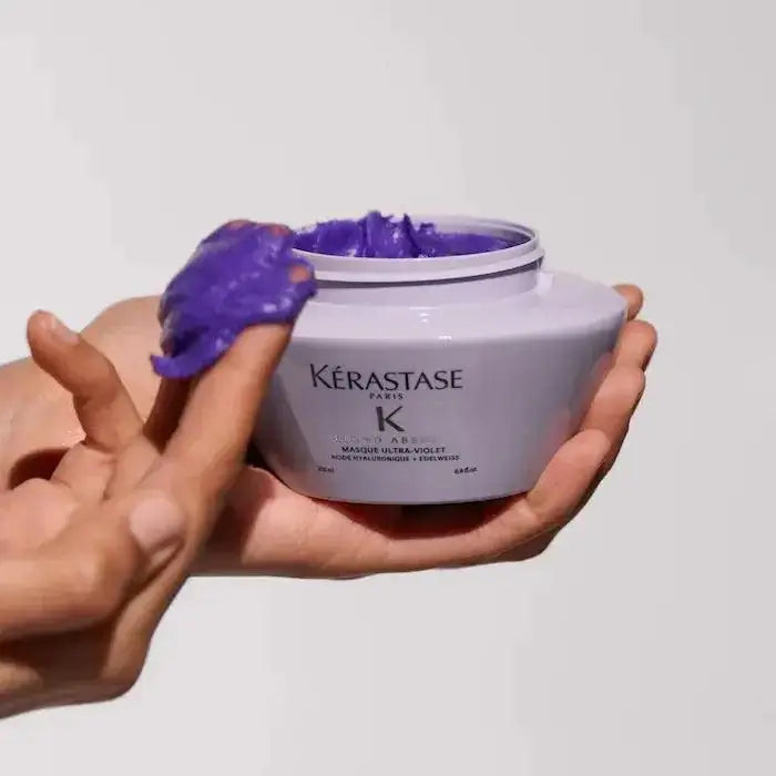 Kérastase Masque Ultra-Violet Hair Mask for neutralizing brassy tones and enhancing cool blonde and grey hues, open jar.