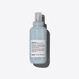Minu Hair Serum bottle, moisturizing leave-on formula for colored hair, enhances shine and color longevity.