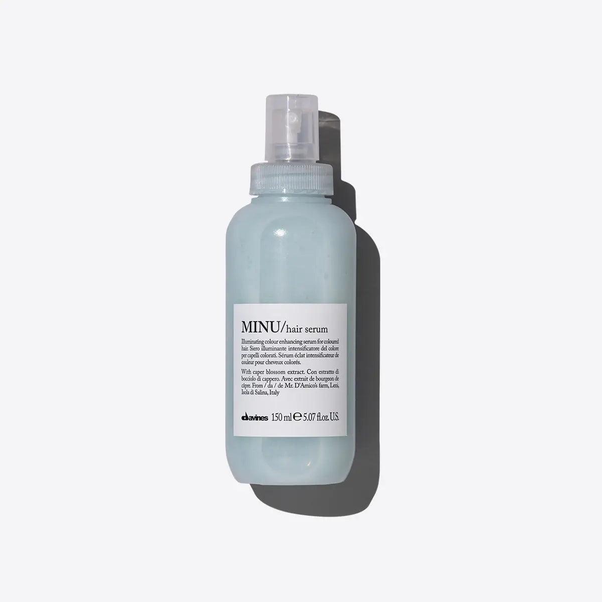Minu Hair Serum bottle, moisturizing leave-on formula for colored hair, enhances shine and color longevity.