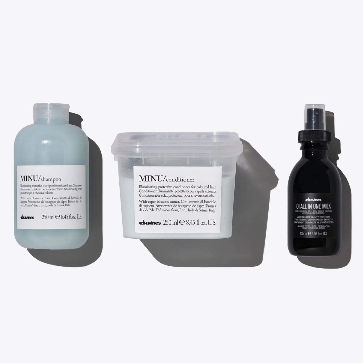 Minu + Oi Set for vibrant color, featuring shampoo, conditioner, and all-in-one milk for enhanced color longevity and shine.