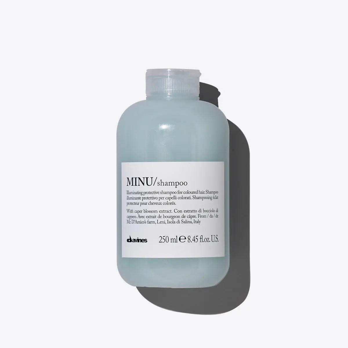 Minu Shampoo bottle for colored hair, 250ml. Gentle cleansing with rich foam, protects and illuminates color for lasting shine.