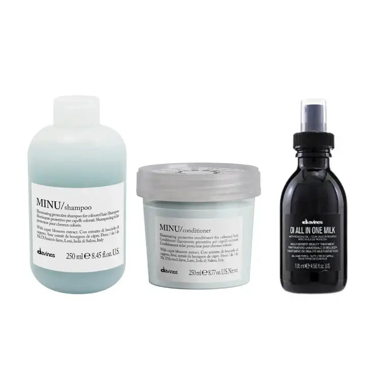 Davines Minu Shampoo, Minu Conditioner, and OI All-in-One Milk set for hair care and smoothness.