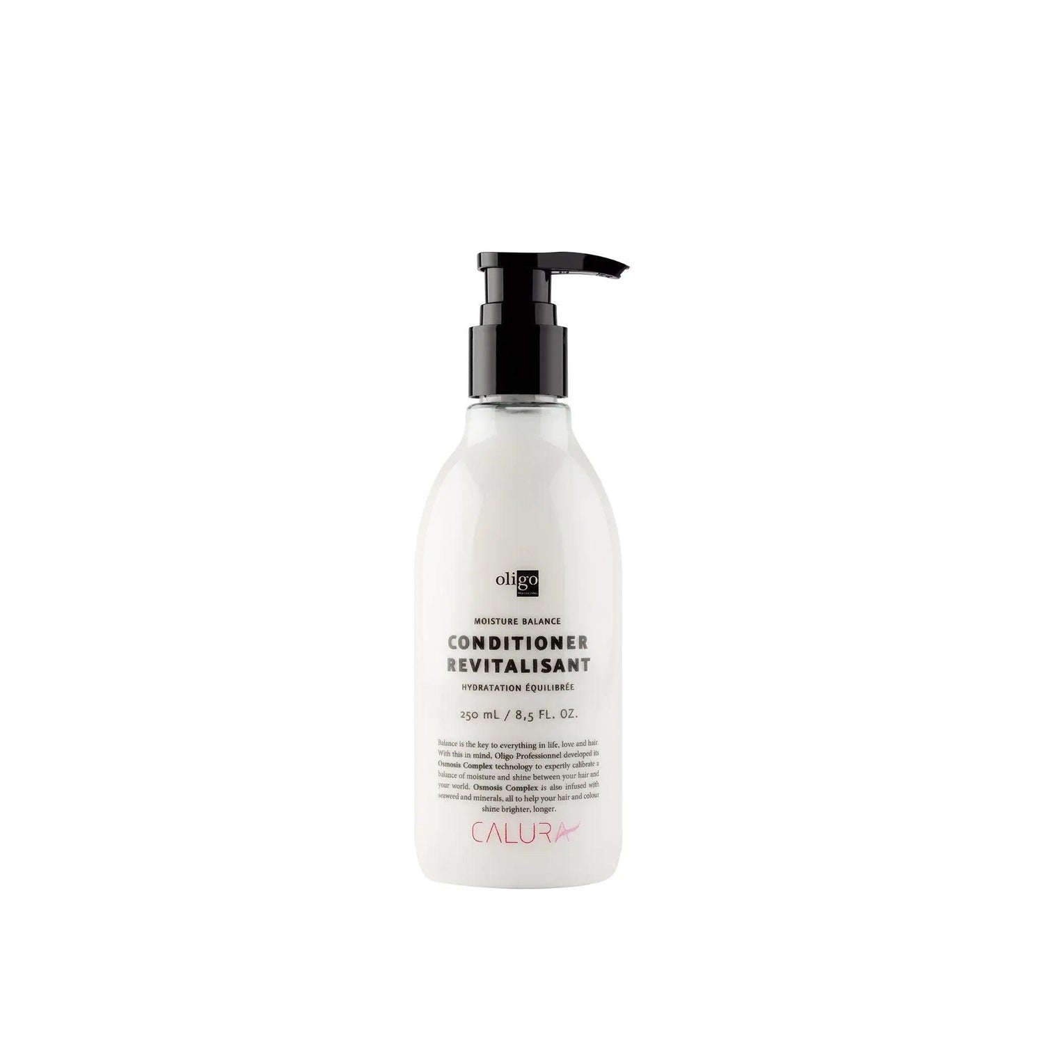 Moisture Balance Conditioner bottle with pump dispenser, vegan, paraben and sulfate-free formula for balanced and hydrated hair.