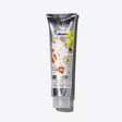 Davines moisturizing balm tube for soft skin and hair, acts as makeup remover, hair conditioner, and body moisturizer.