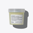 Momo Conditioner jar, a moisturizing product for dry or dehydrated hair, offers hydration and detangling for soft, silky results.