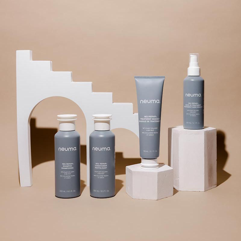 Collection of Neu Repair Treatment Masque products for revitalizing and nourishing hair with lemon, lavender, and fir needle aroma.