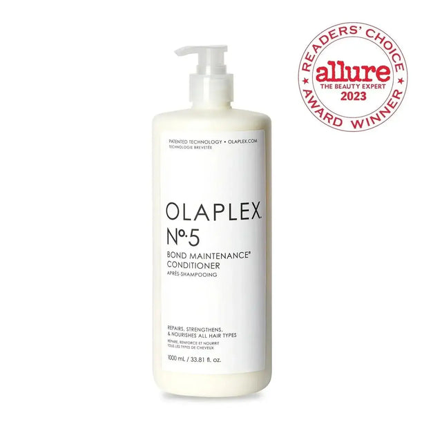 Olaplex Nº.5 Bond Maintenance Conditioner Liter bottle with Allure award stamp, designed to repair and strengthen damaged hair.