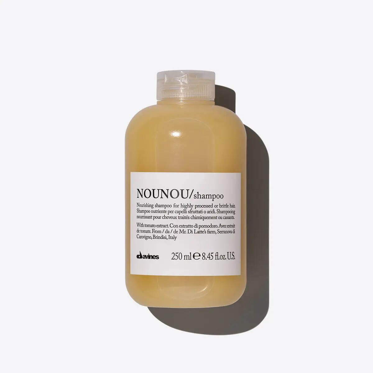 Nounou Shampoo bottle for nourishing damaged hair, ideal for bleached or permed hair, offering hydration and restoring softness.
