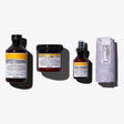 Davines Nourished Blowout Set including shampoo, conditioner, serum, and bar soap on a white background.