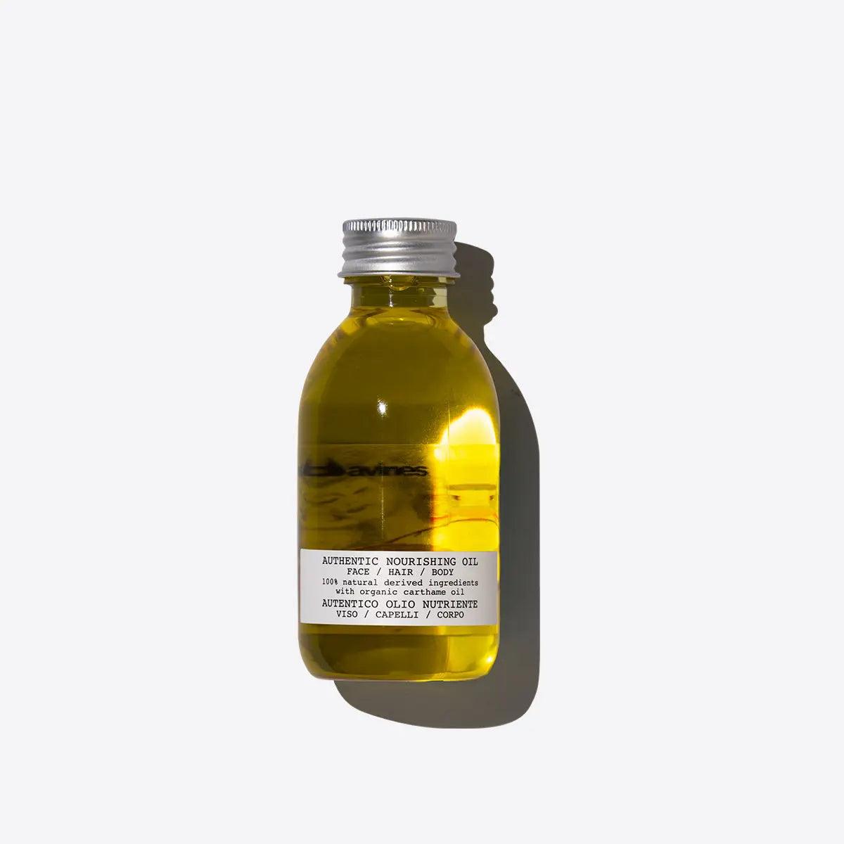 Nourishing Oil bottle for moisturizing hair and skin, enhances softness and shine, providing silky hair and velvety skin care.