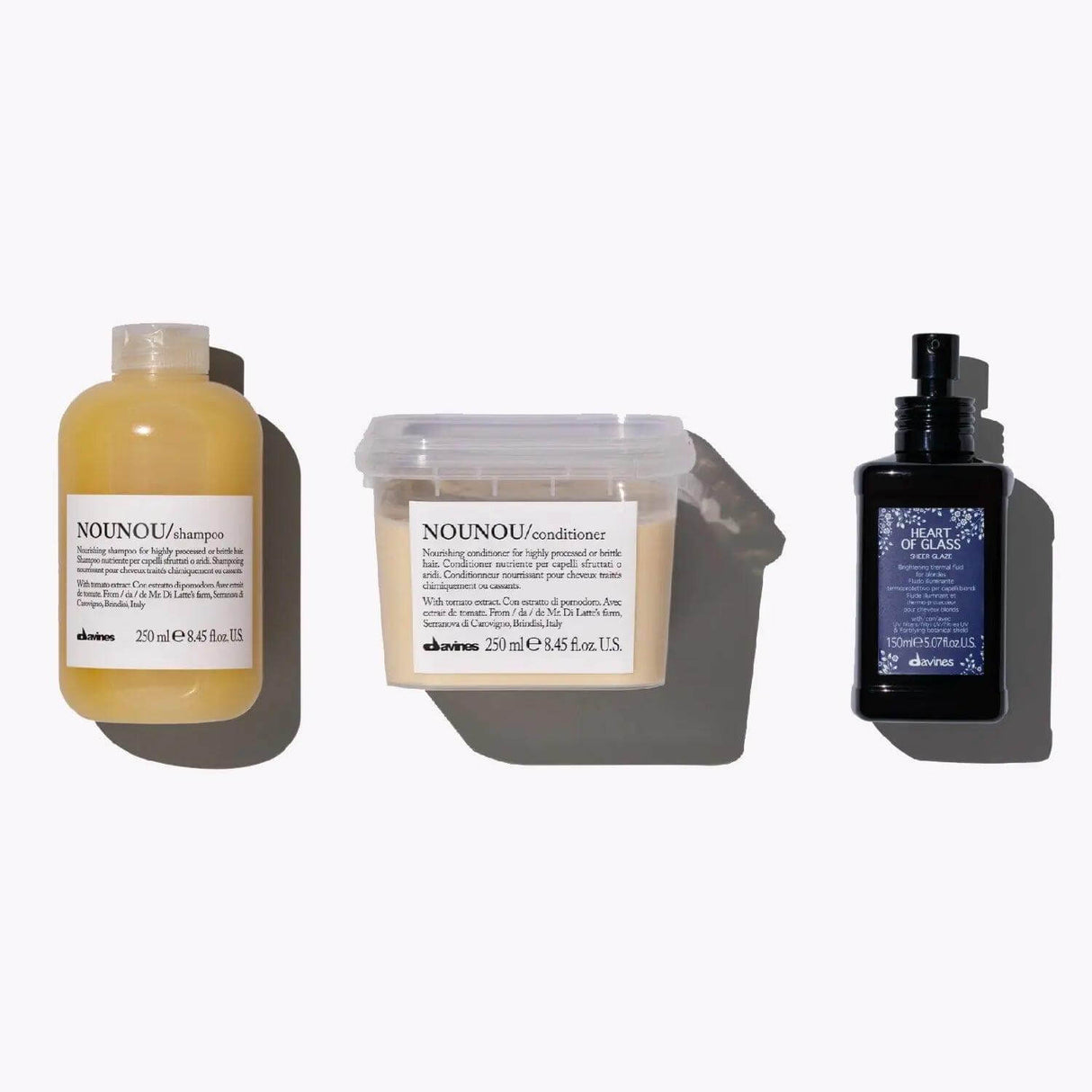 Nourishing Set For Blondes: NOUNOU shampoo, conditioner, and Heart of Glass Sheer Glaze for hydrating and repairing blonde hair.