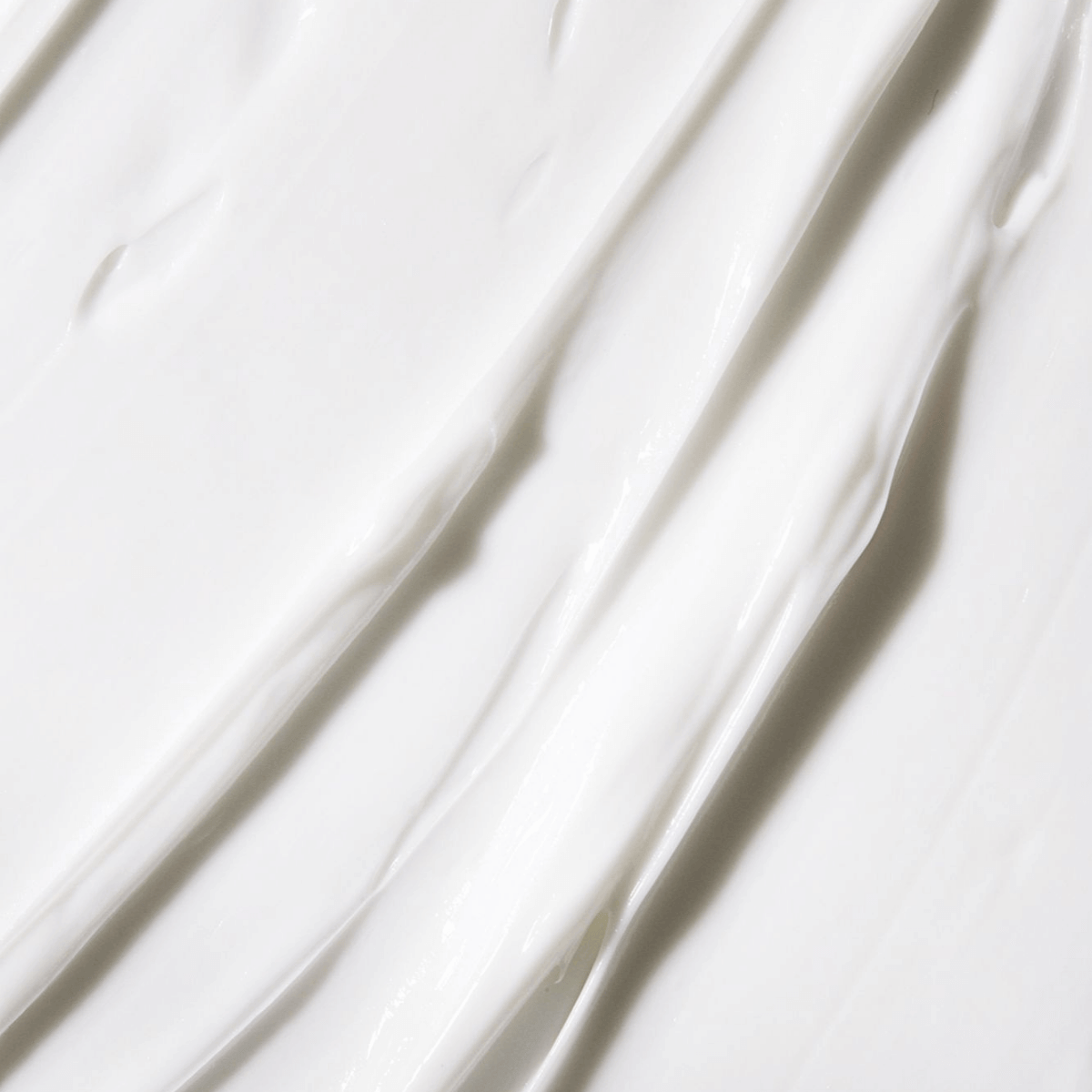Rich body cream texture with nourishing ingredients like Shea butter, avocado oil, and aloe vera for soft, smooth skin.