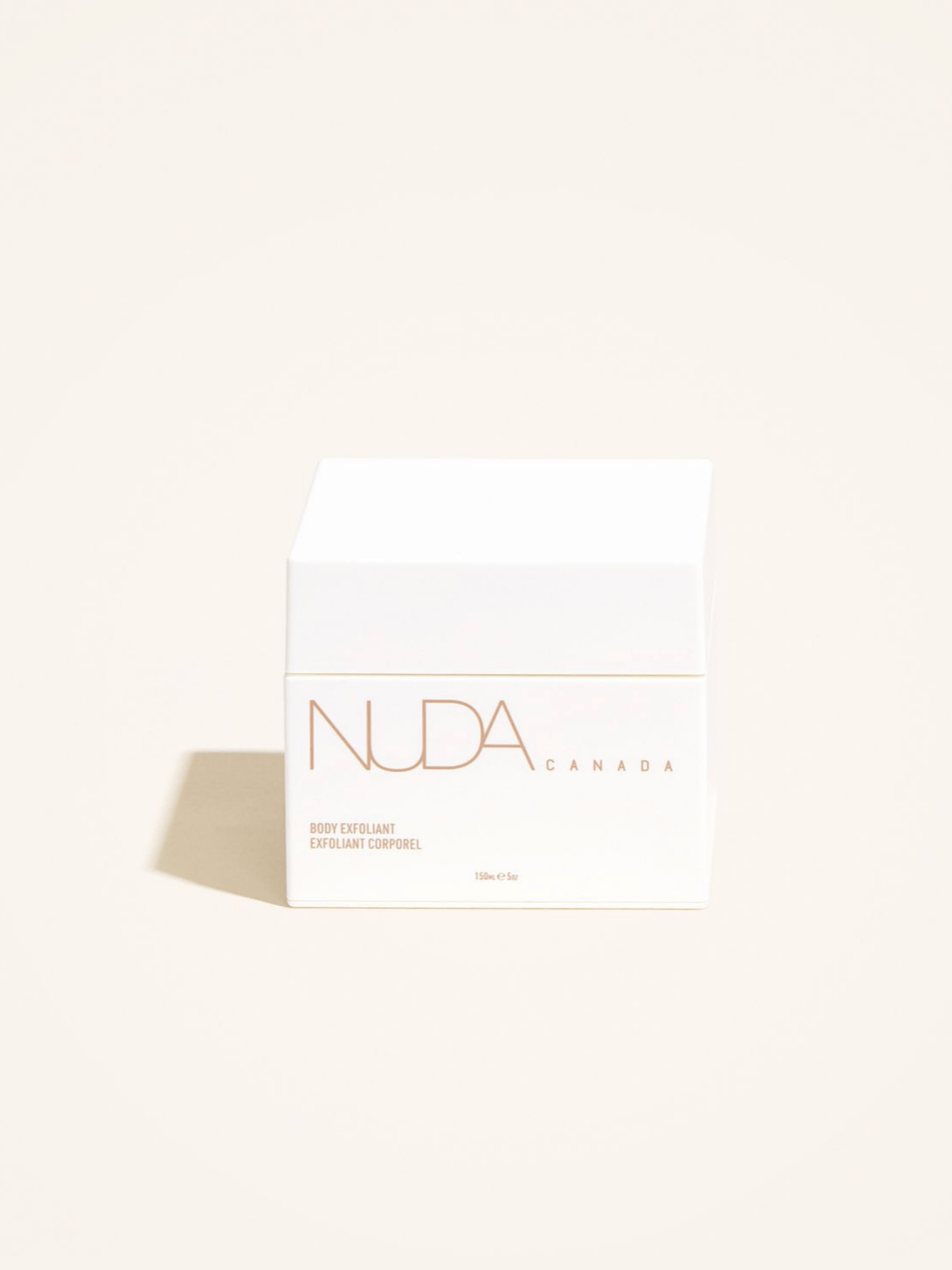 Nuda Canada Body Exfoliant with Coffee Arabica and coconut oil for smoother, healthier skin in a luxurious and creamy texture.