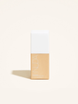 Gold Body Shimmer bottle with white cap, offering a sun-kissed glow infused with Aloe Vera, avocado oil, grape seed oil, and vitamin E.