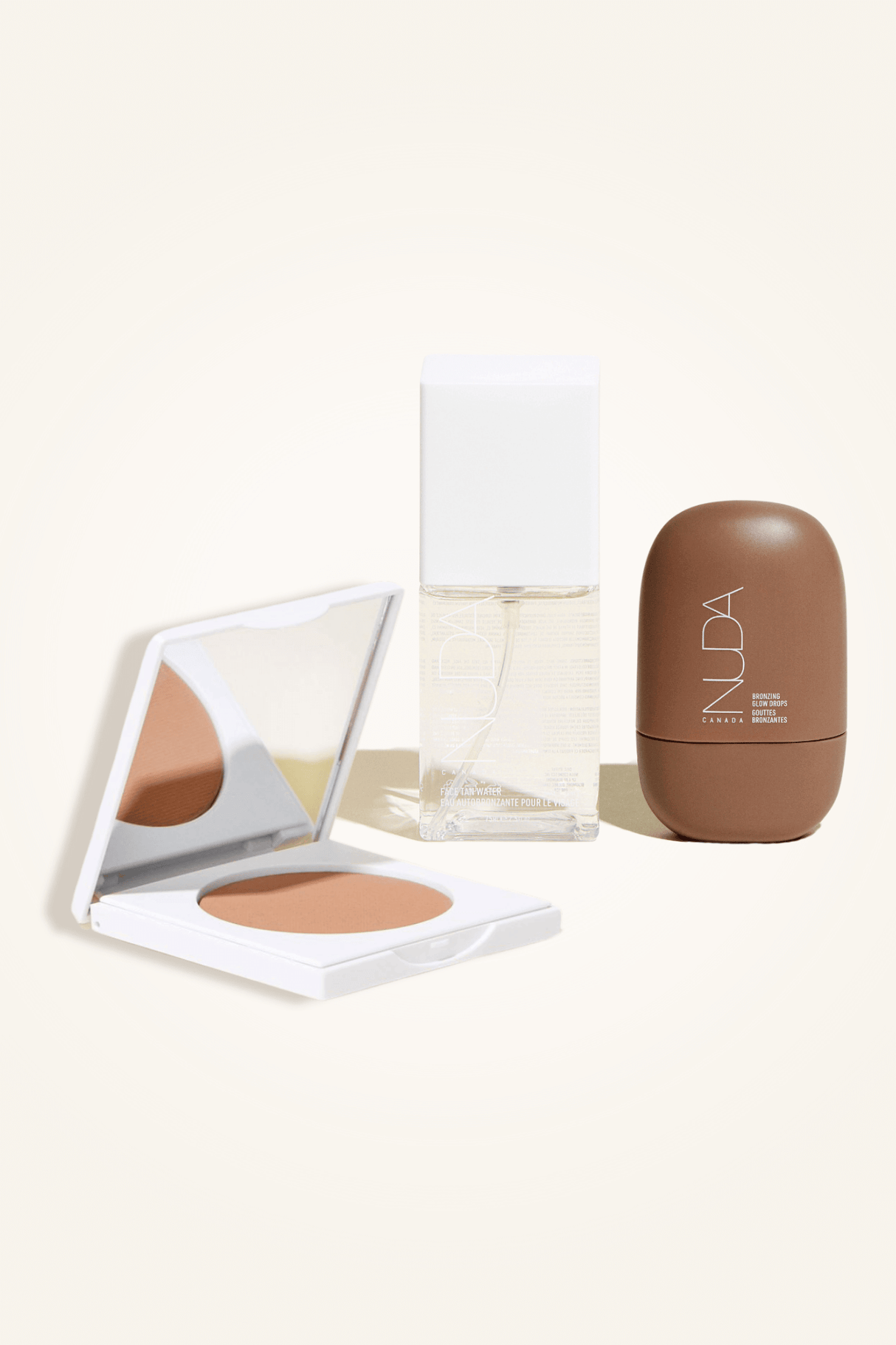 Deluxe Bronzed Trio with matte bronzing powder, facial self tanner, and body shimmer for radiant bronzed look.