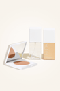 Deluxe Bronzed Trio with self tanner, bronzing powder, and body shimmer for a radiant look.