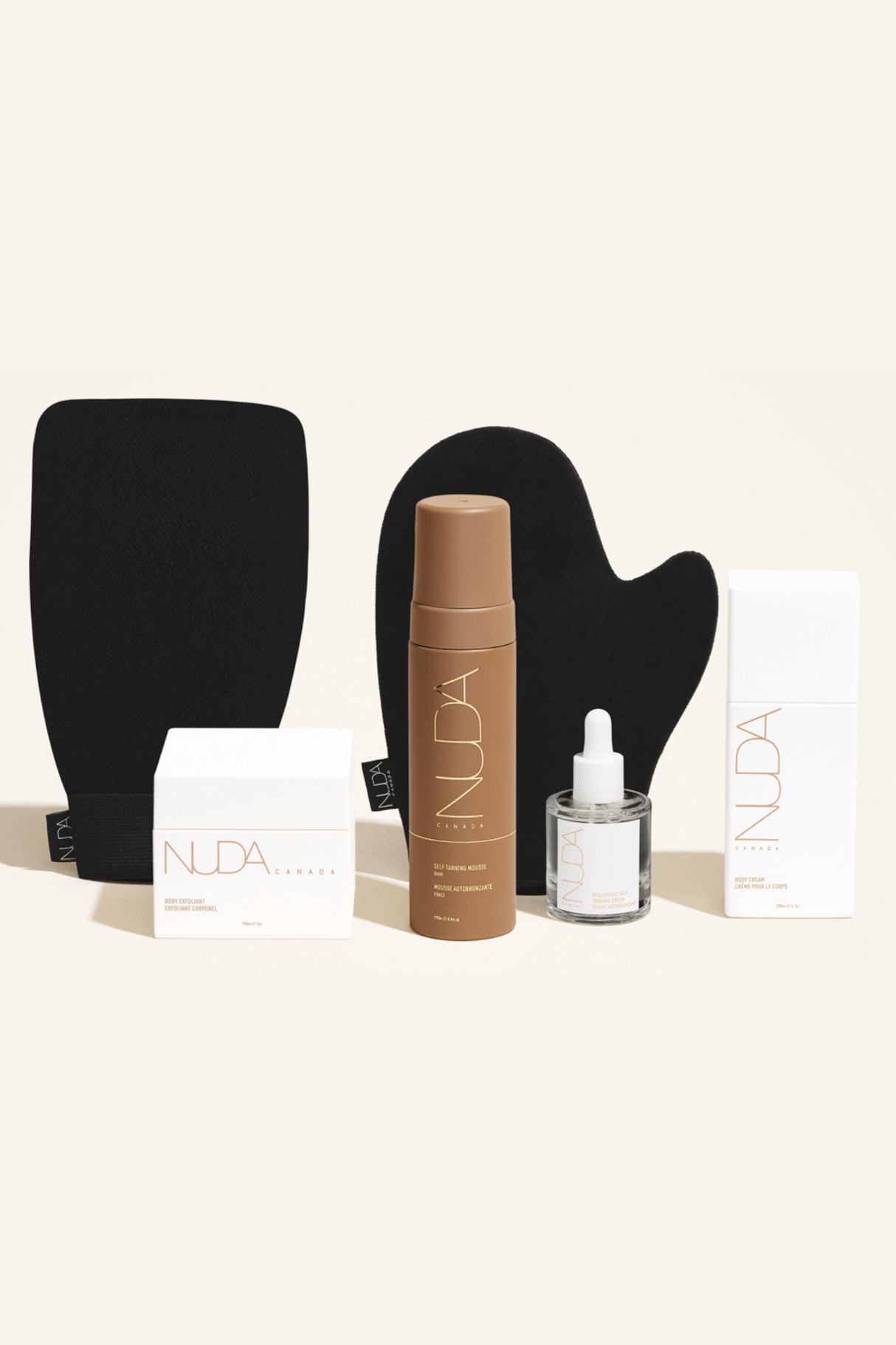 Deluxe Routine Kit featuring exfoliating mitt, self tanning mousse, face tanner, and body cream for a sun-kissed glow.