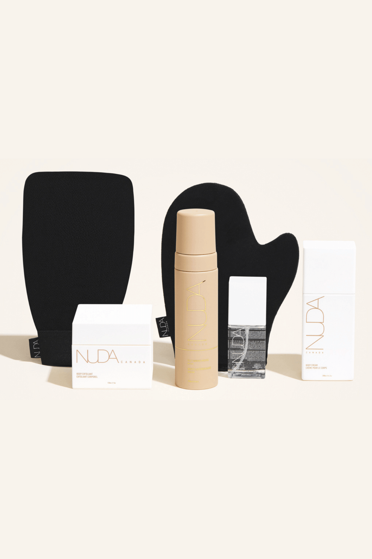 Deluxe Routine Kit including self tanning mousse, exfoliating mitt, and body cream for a sun-kissed glow year-round.